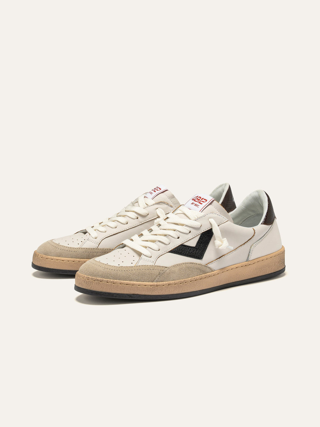 PLAYNEW Sneakers in White and Black Leather