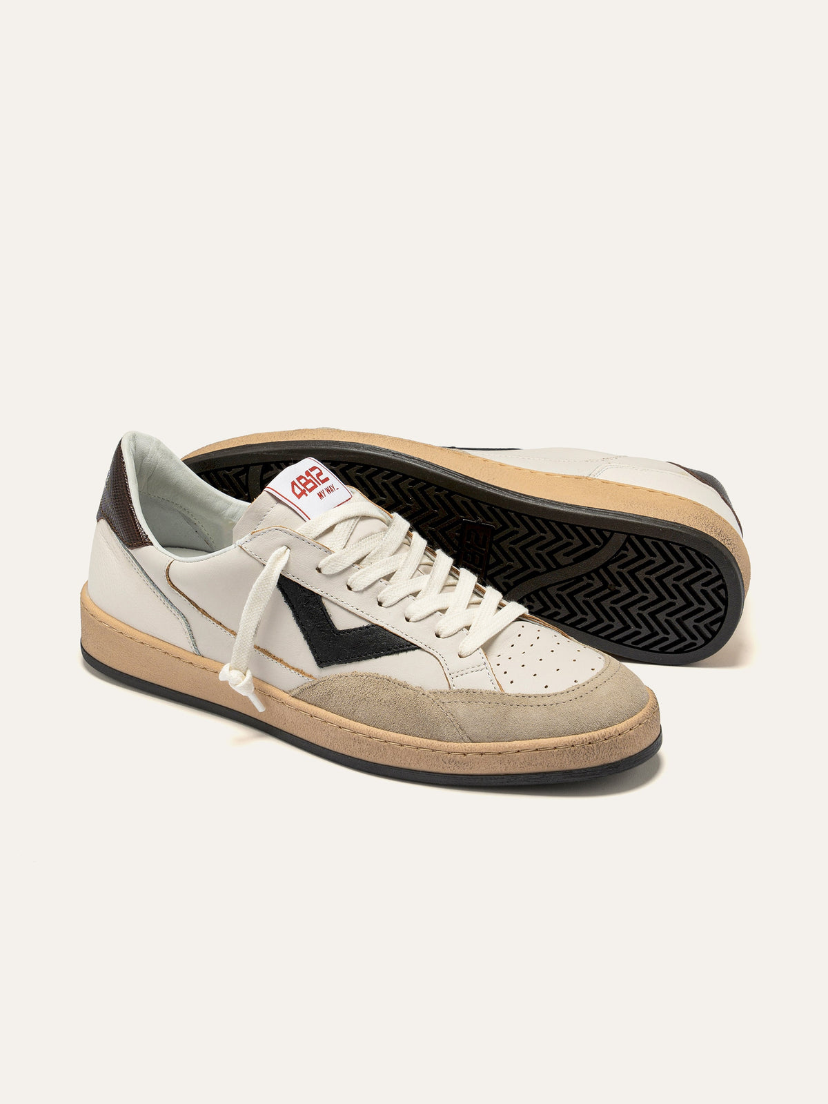 PLAYNEW Sneakers in White and Black Leather