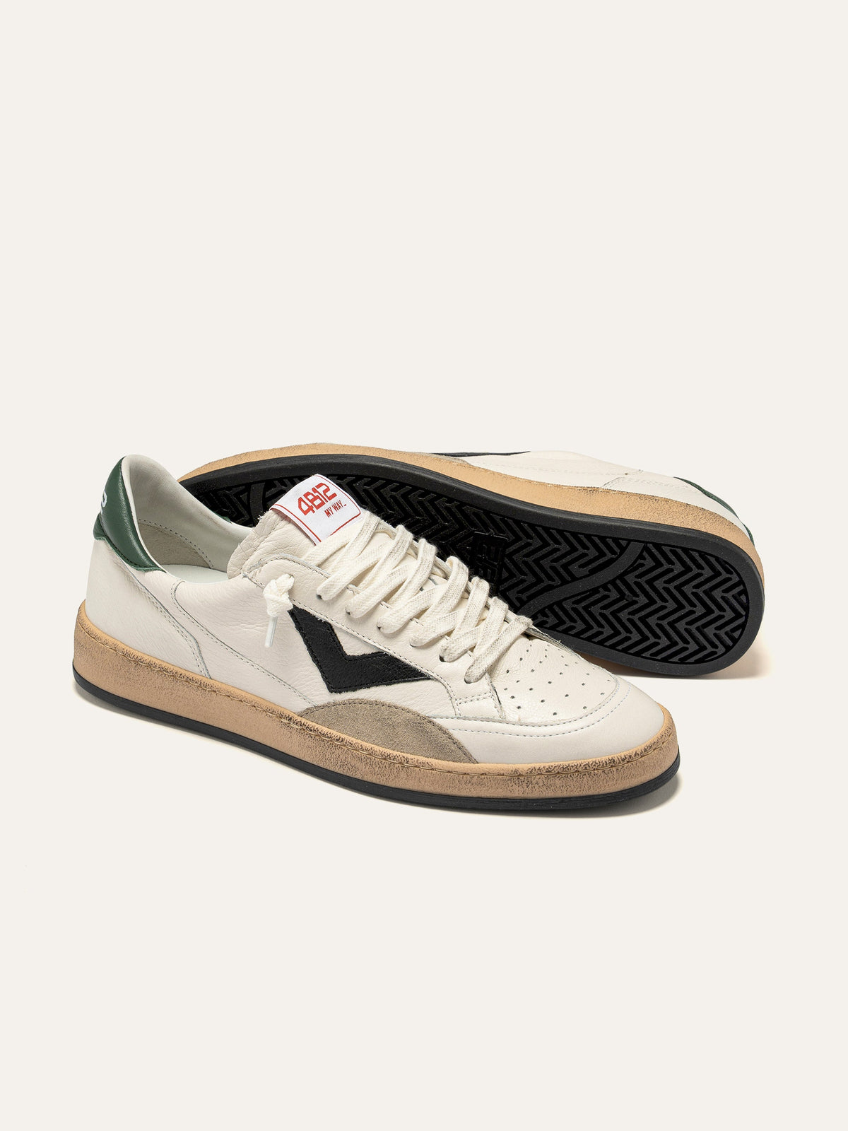 PLAYNEW Sneakers in White and Black Leather