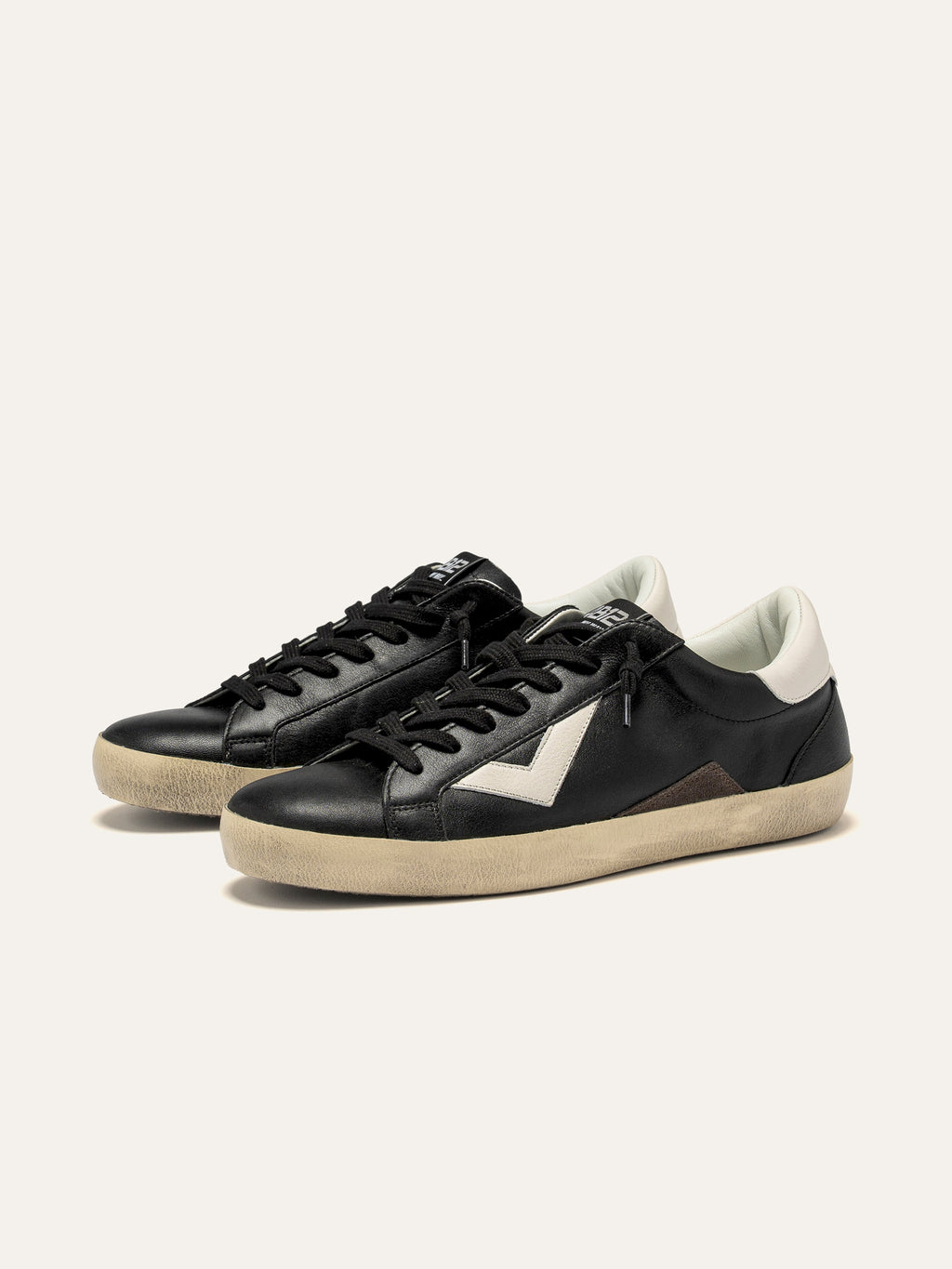SUPRIME Sneakers in Black and White
