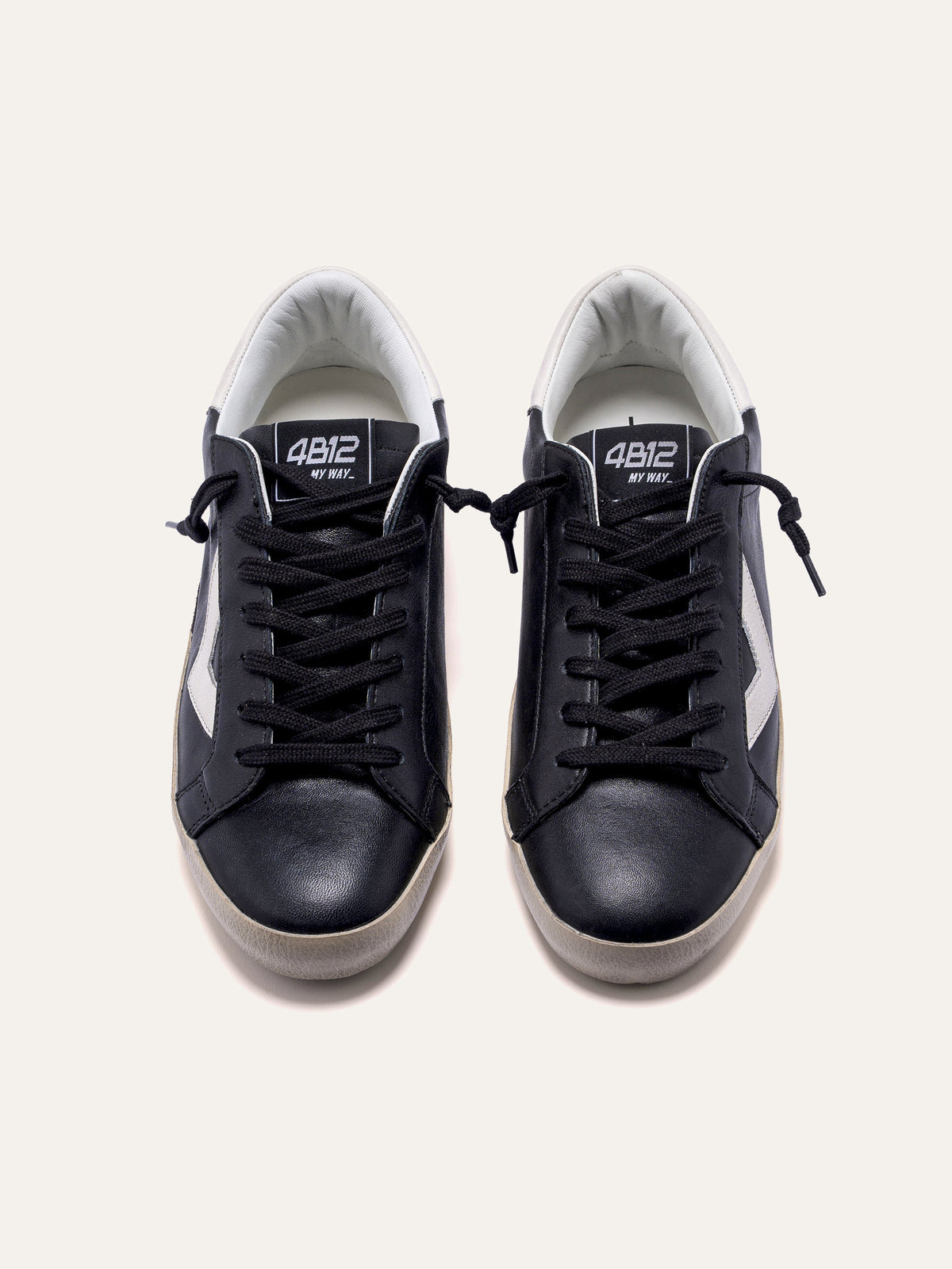 SUPRIME Sneakers in Black and White
