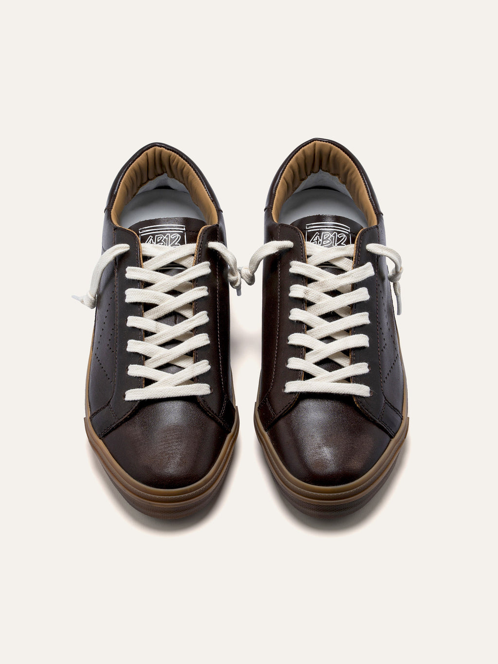 SUPRIME Sneakers in Dark Brown
